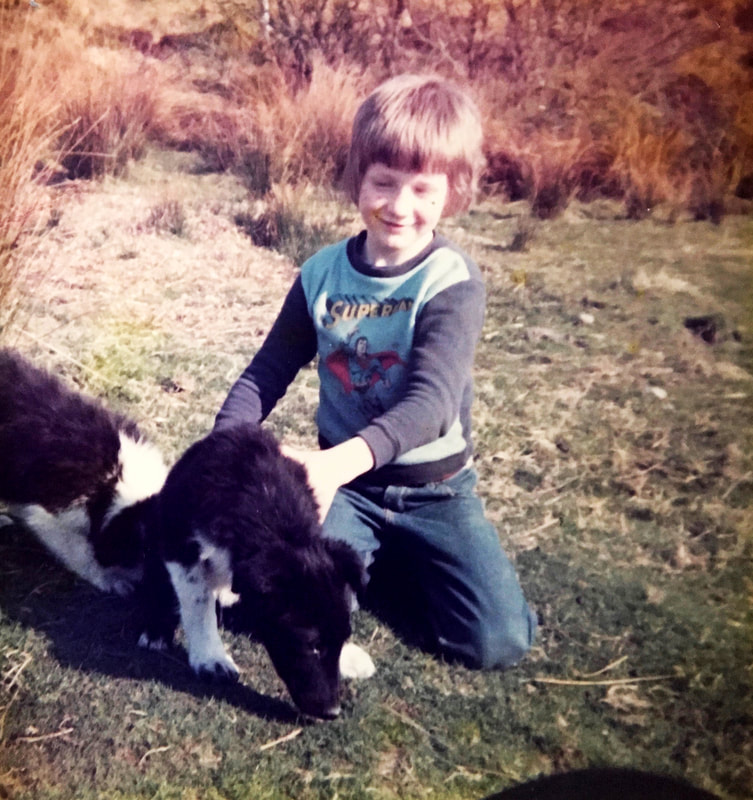 A photo of brodyquixote as a wee boy on his Granny's farm with pups.Picture